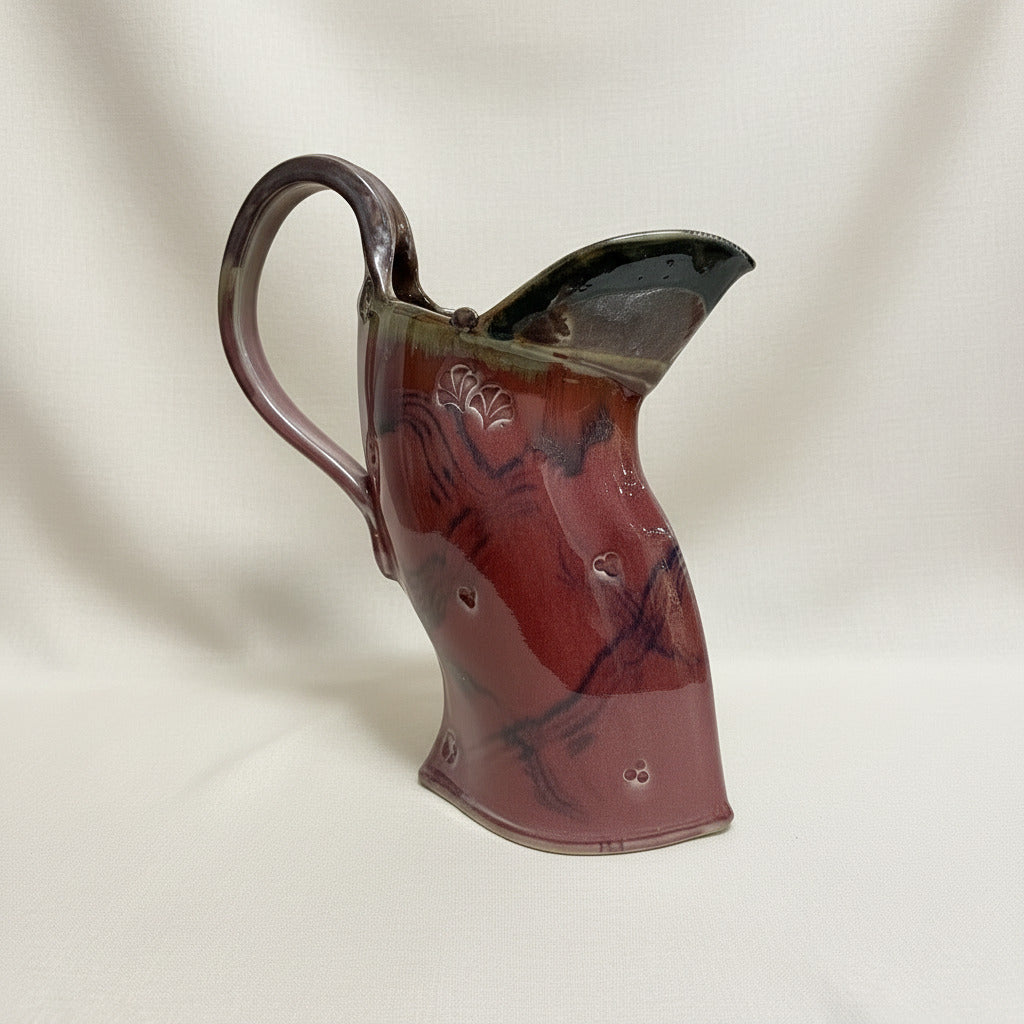 Bent Pitcher