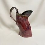Bent Pitcher