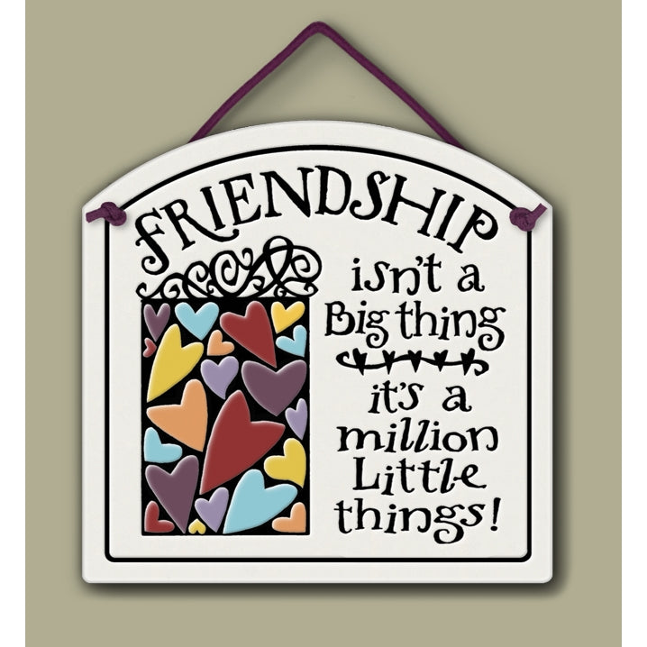 "Friendship isn't a big thing - it's a million little things". Stoneware Plaque